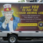 Billboard depicting Fauci as Uncle Sam urging action.