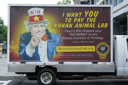 Billboard depicting Fauci as Uncle Sam urging action.