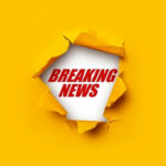 EBOLA Outbreak Forces Rare Global Emergency… Breaking News text on yellow torn paper background.