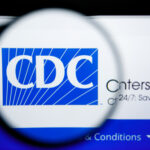 Magnified view of the CDC logo on a computer screen