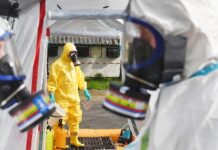 Americans STRANDED – Kenya STOPS Trump’s Ebola Plan… Emergency responders in hazmat suits preparing for a situation