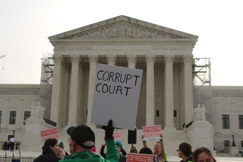 Washington,,Dc,-,March,26,,2024:,Protesters,Hold,Up,Signs Protesters holding signs in front of the Supreme Court building