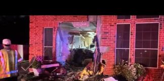 Woman dies after Tesla driver slams into home in Katy area