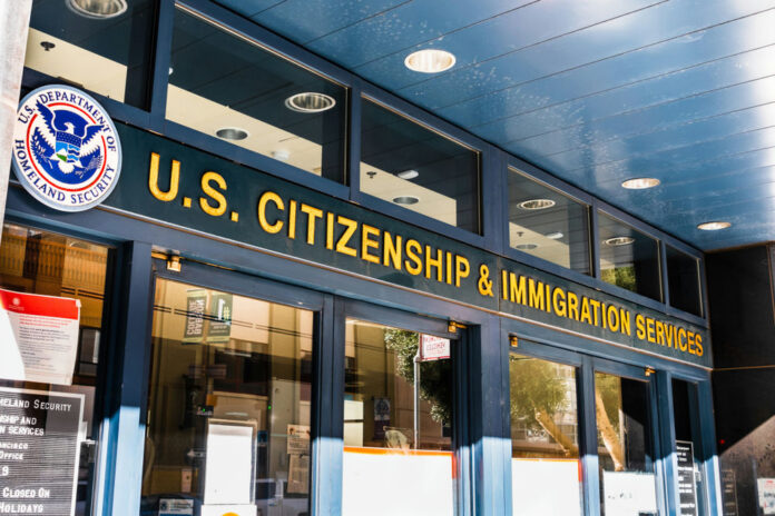 shutterstock_1569360250 US Citizenship and Immigration Services building entrance