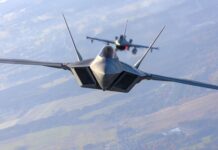 Allies Face New Test In Asia — What’s The Endgame? Two military fighter jets flying in formation against a blue sky