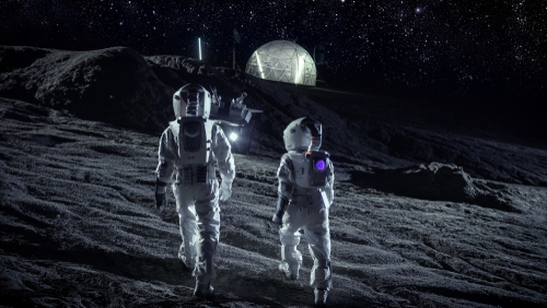 Following,Shot,Of,Two,Astronauts,In,Space,Suits,Walk,On Two astronauts walking on the moon with a dome structure in the background