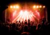 Fans Soaked, Show Scrapped — Why So Late? concert crowd under bright stage lights