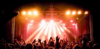 concert crowd under bright stage lights