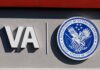 A Fake Benefit With Real Consequences VA logo and Department of Veterans Affairs seal on building wall