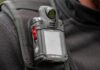 Close-up of a body camera attached to a persons shoulder